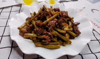 酸豆角炒鸡胗（酸豆角炒鸡胗怎么做才好吃窍门）